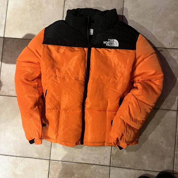 The North Face  Orange Women's Puffer Jacket